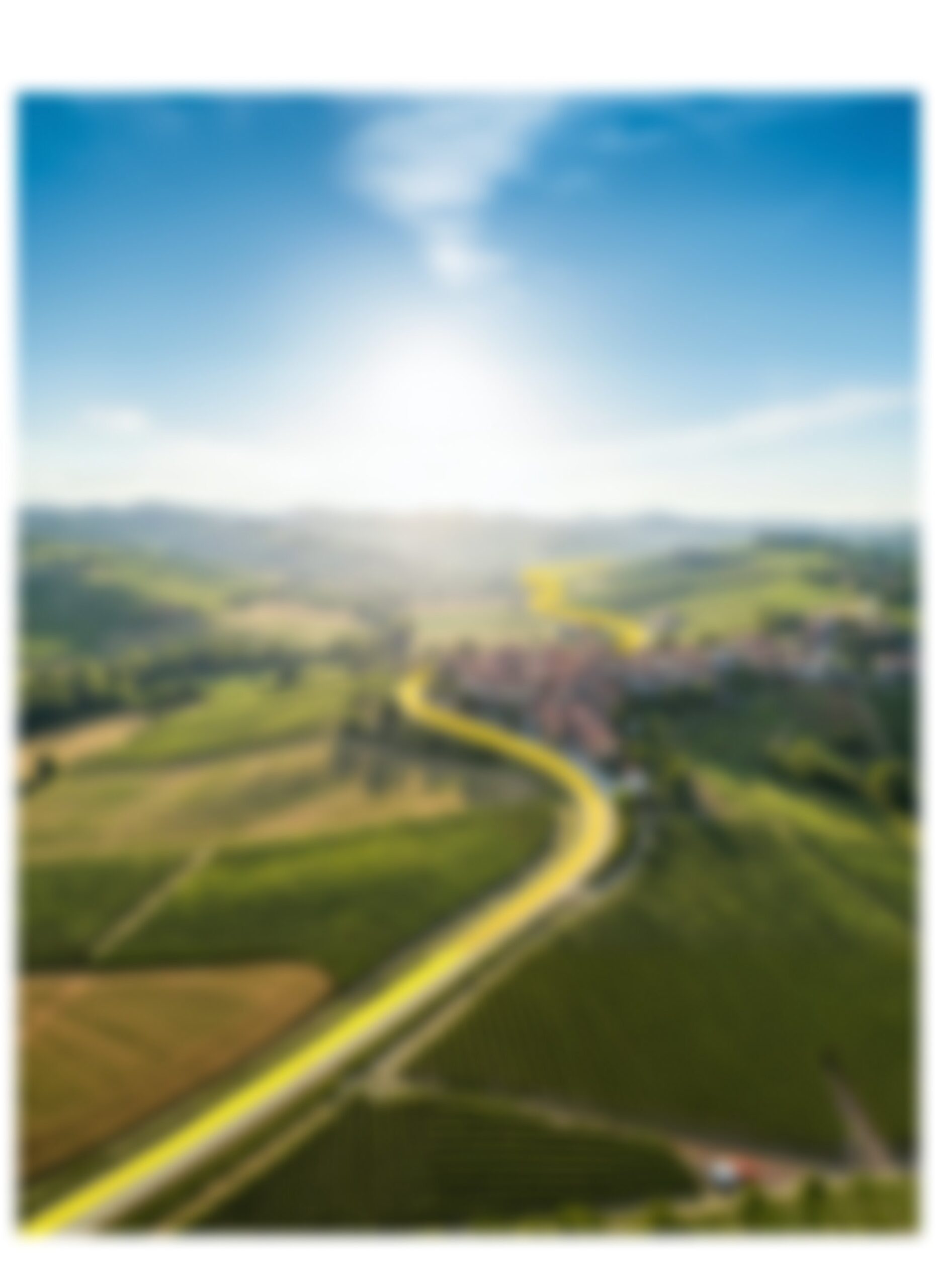 Colline del Pinerolese con il filo giallo dell'energia